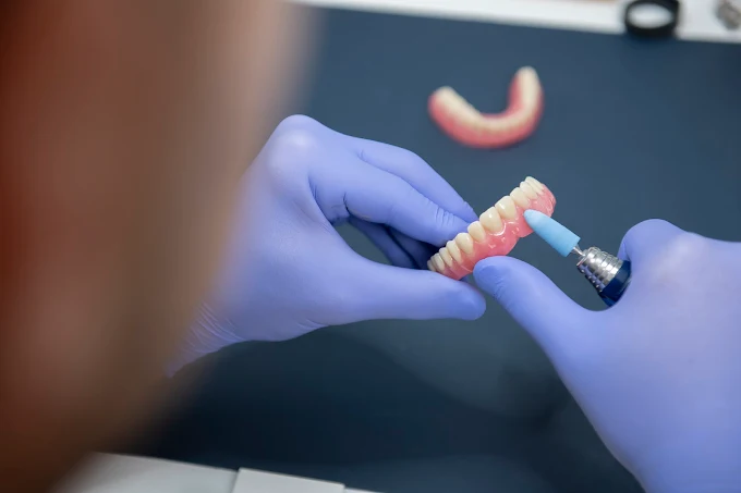 Dental prosthetist crafting a custom denture at Hancock Denture Clinic in Shoalhaven